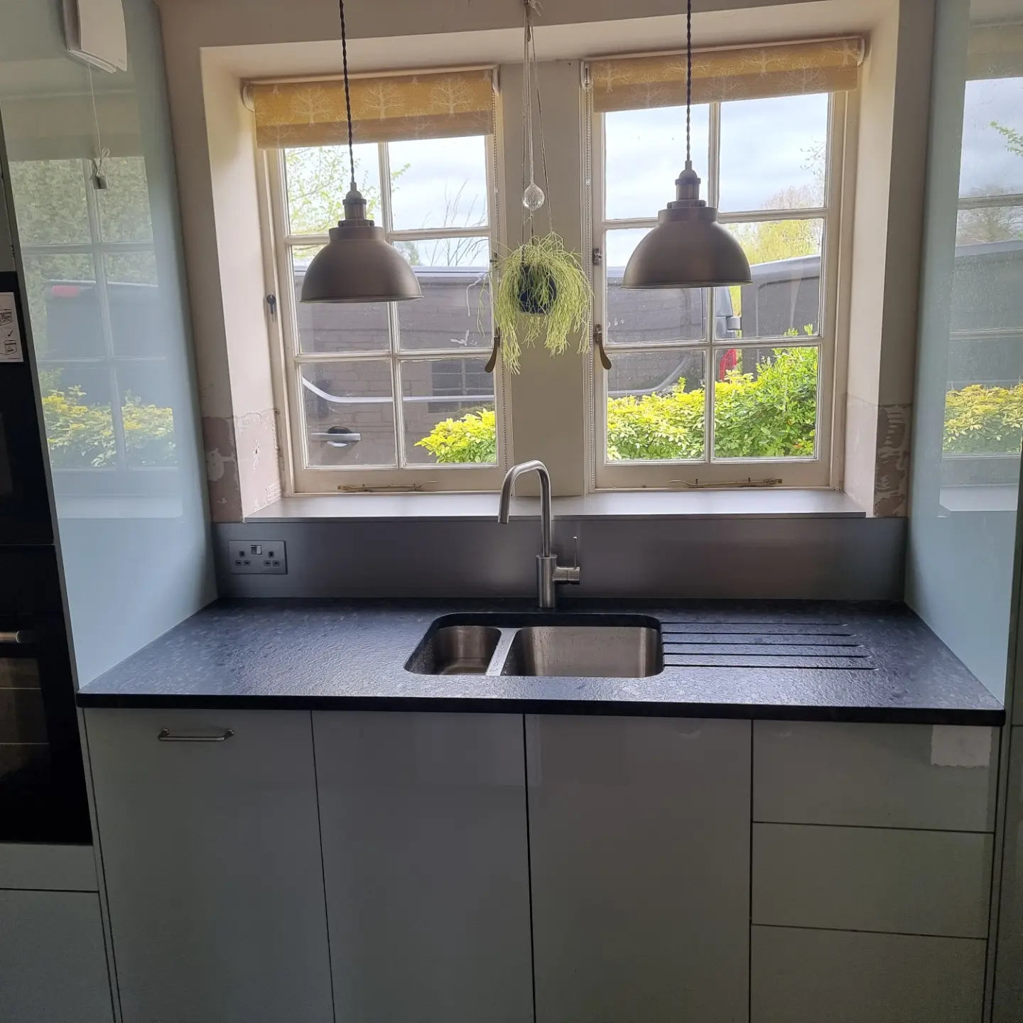Blue and stainless steel fitted kitchen installed by Paul Lynam in Bradford on Avon