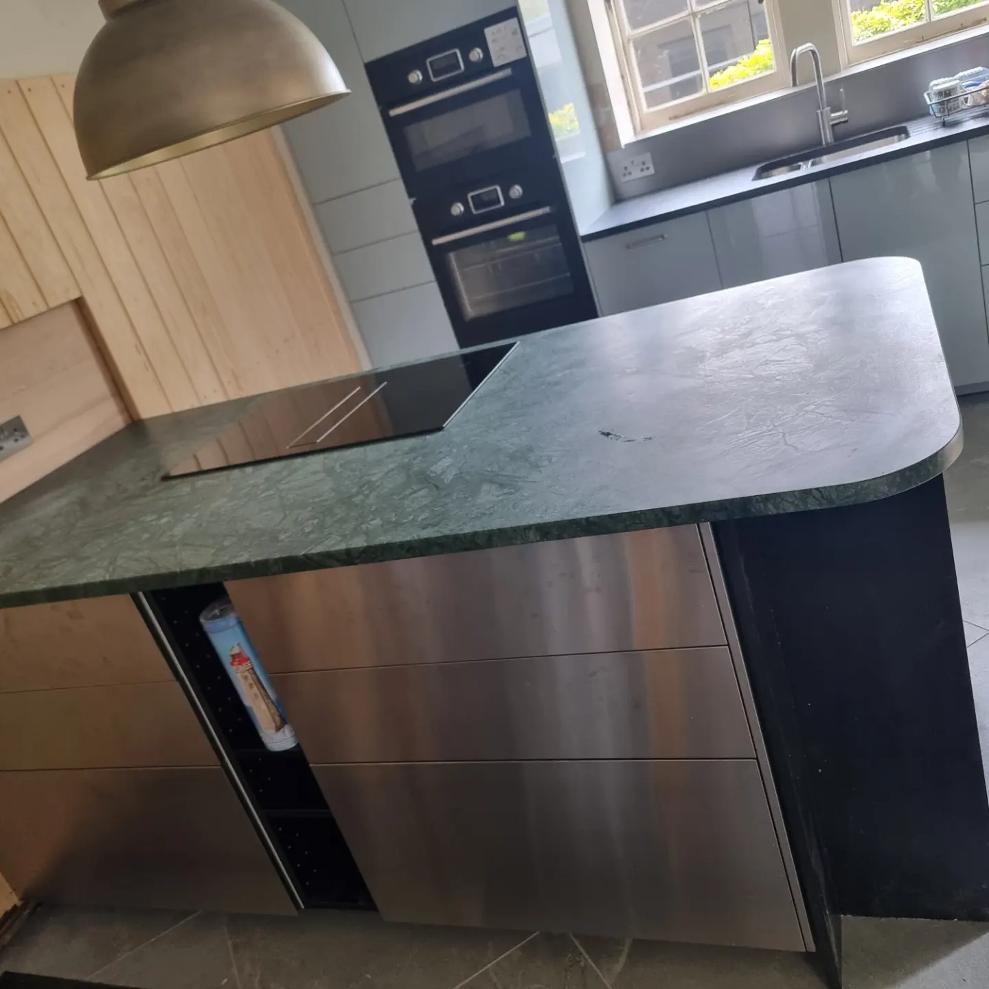 Blue and stainless steel fitted kitchen installed by Paul Lynam in Bradford on Avon