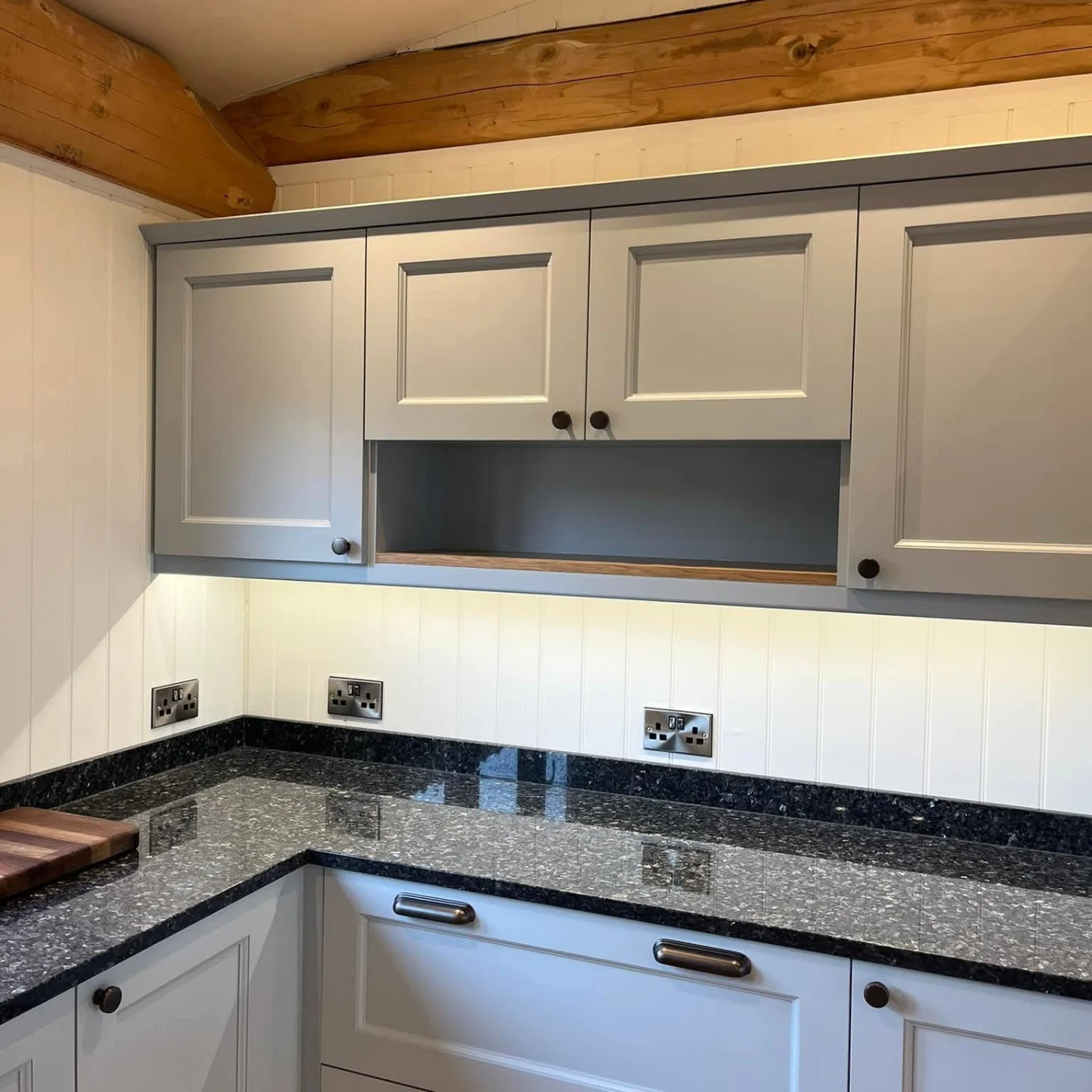 Light grey Shaker-style fitted kitchen installed by Paul Lynam in Bristol