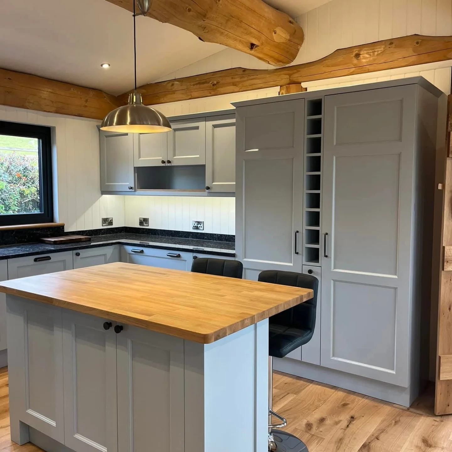 Light grey Shaker-style fitted kitchen installed by Paul Lynam in Bristol