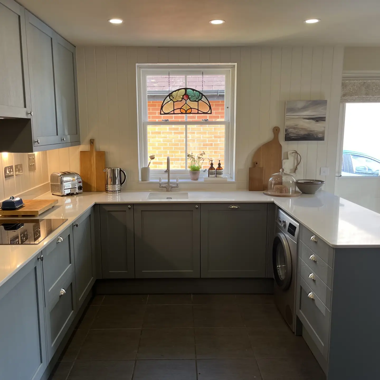 Slate-grey Shaker-style fitted kitchen installed by Paul Lynam