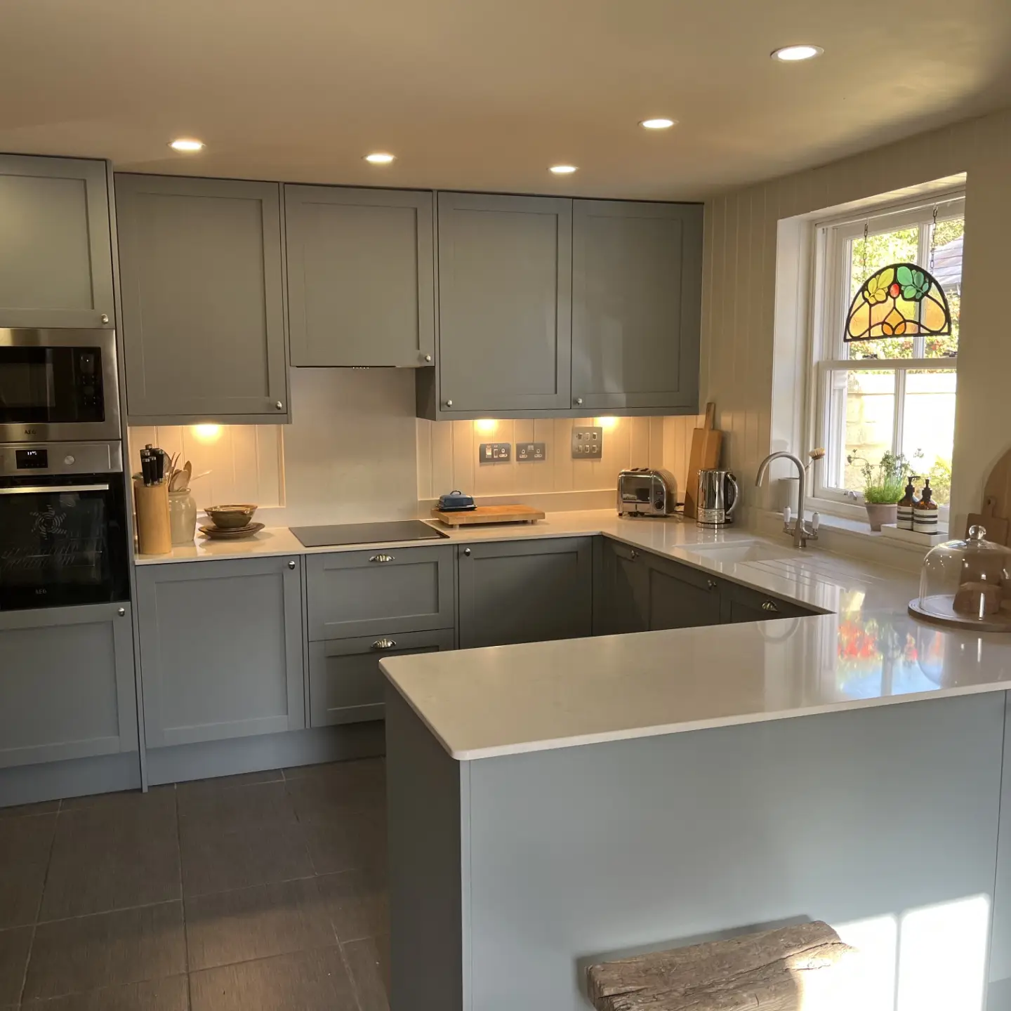 Slate-grey Shaker-style fitted kitchen installed by Paul Lynam