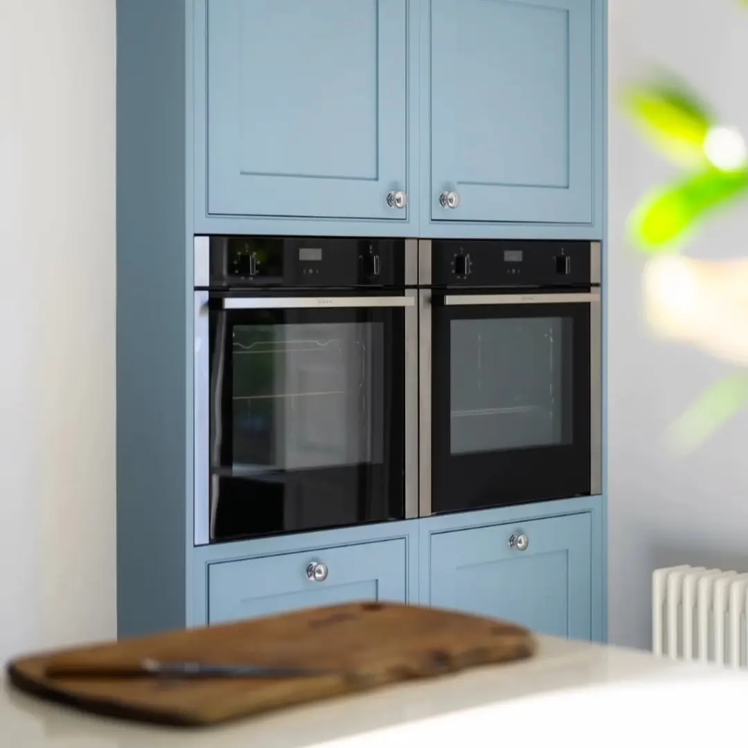 Blue Shaker-style fitted kitchen installed by Paul Lynam in Weston, Bath