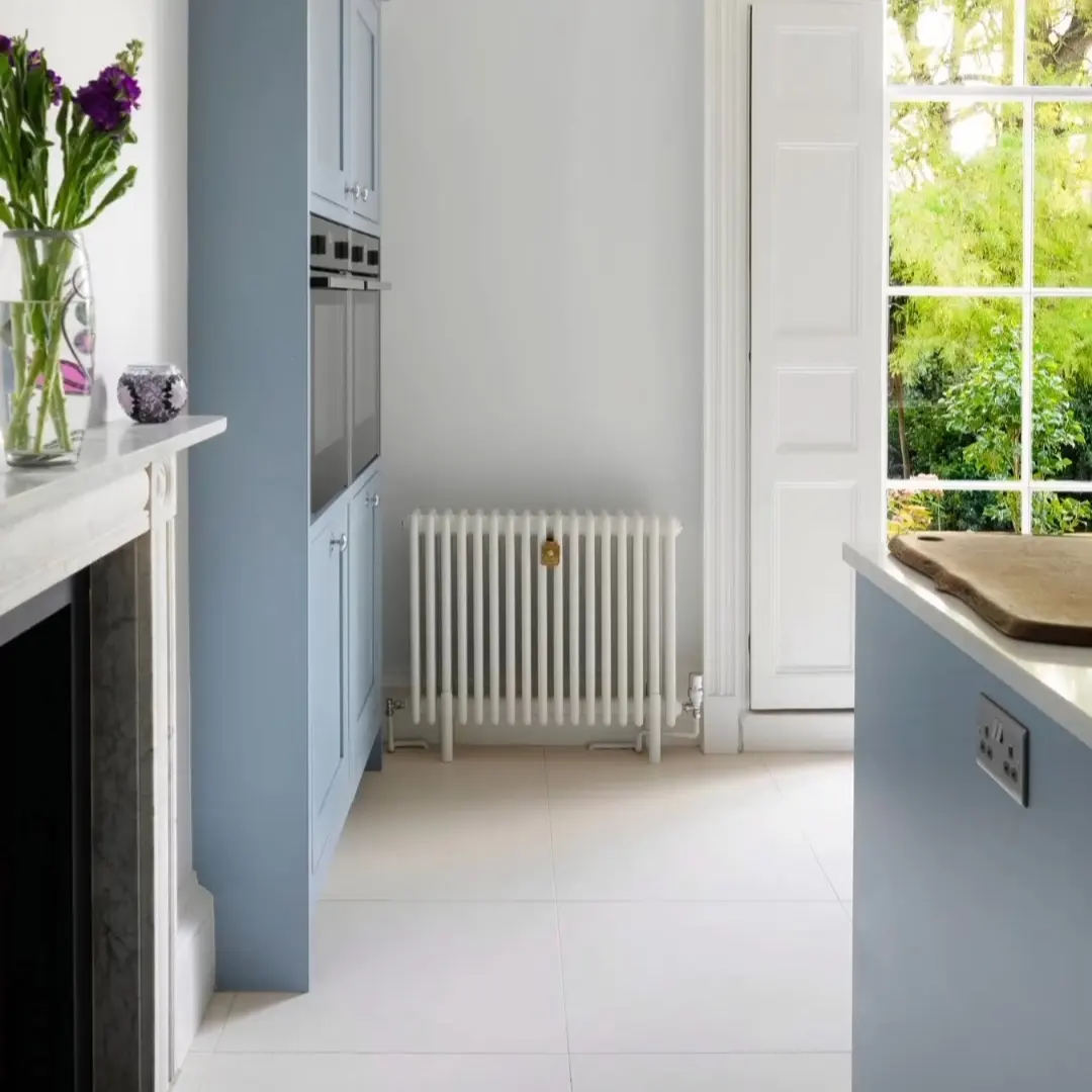 Blue Shaker-style fitted kitchen installed by Paul Lynam in Weston, Bath